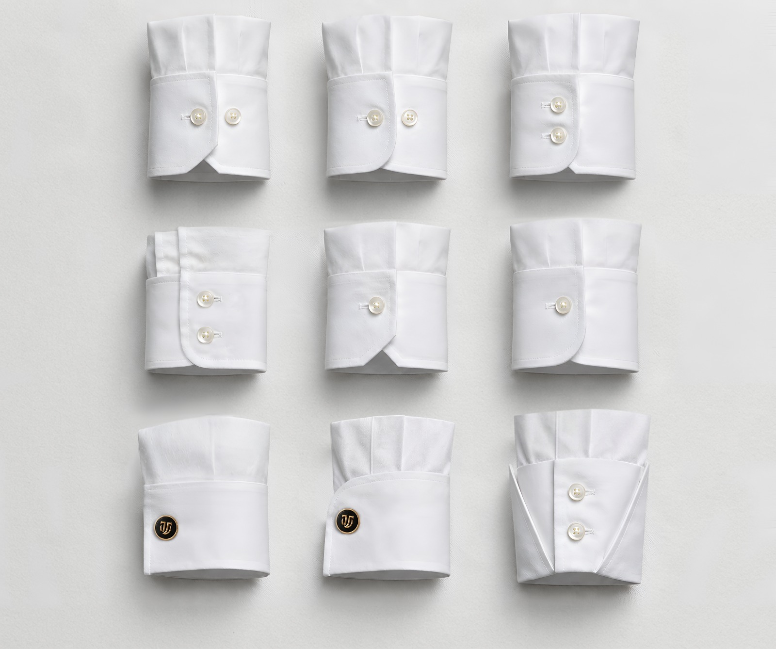 Nine white shirt cuff styles laid out in a grid, including cufflink and button cuffs